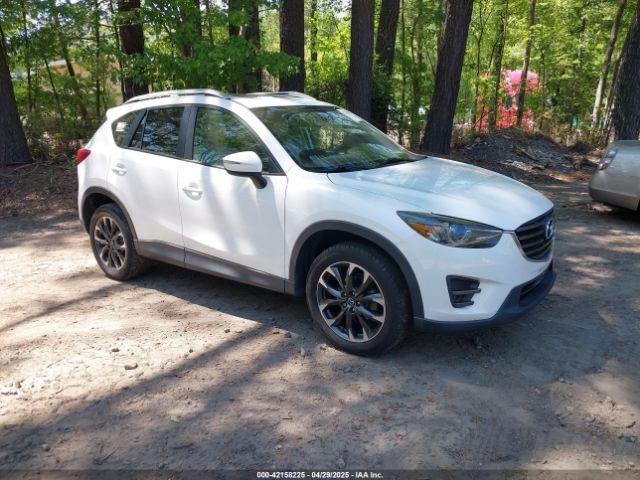  Salvage Mazda Cx